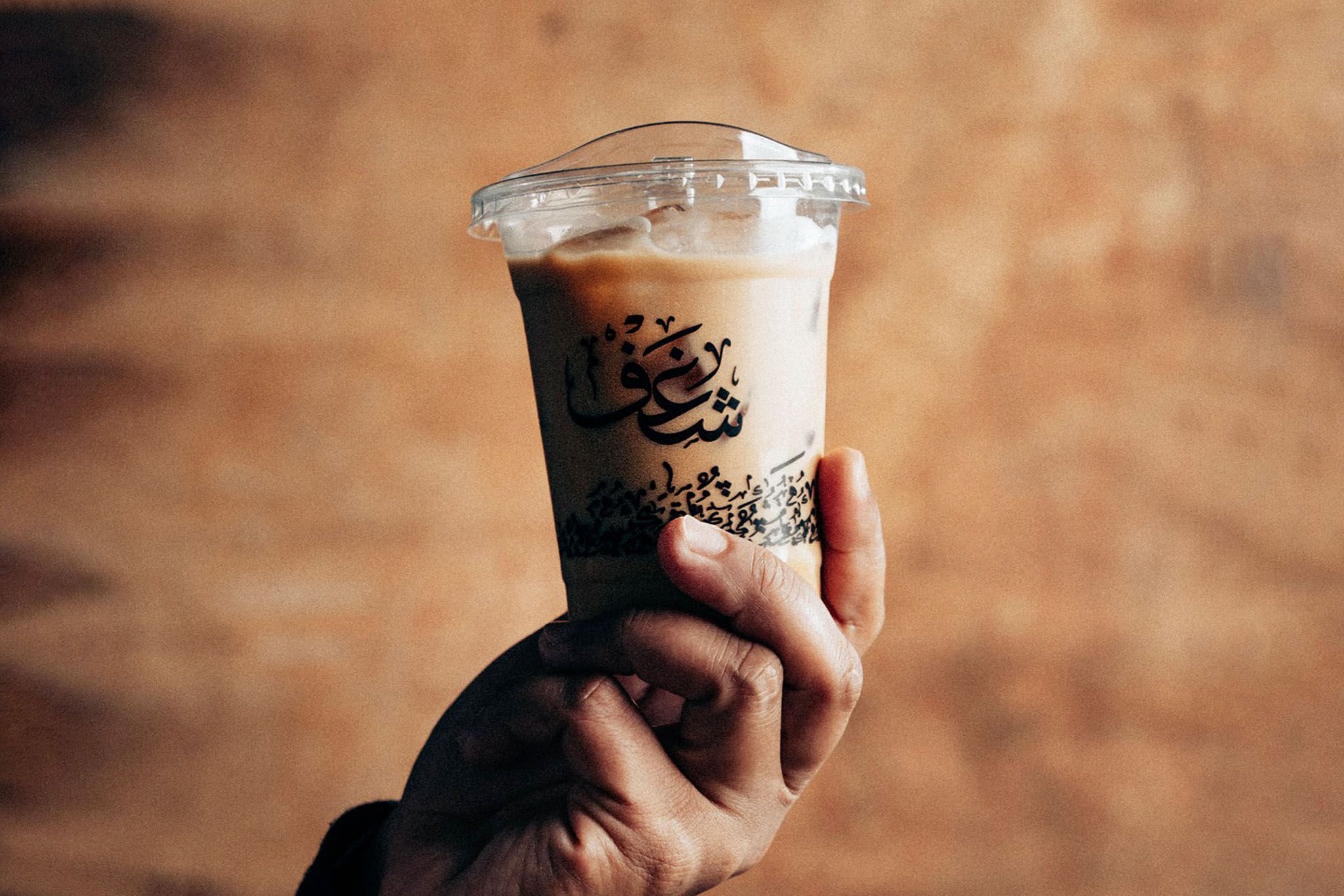 Handcrafted latte art at a specialty coffee shop in Dubai