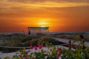 Live music venues Dubai — Barasti Beach bar stage at sunset