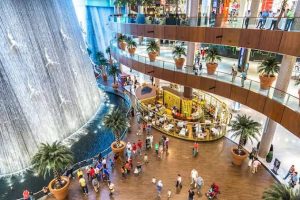 Dubai shopping guide tourists exploring The Dubai Mall interior