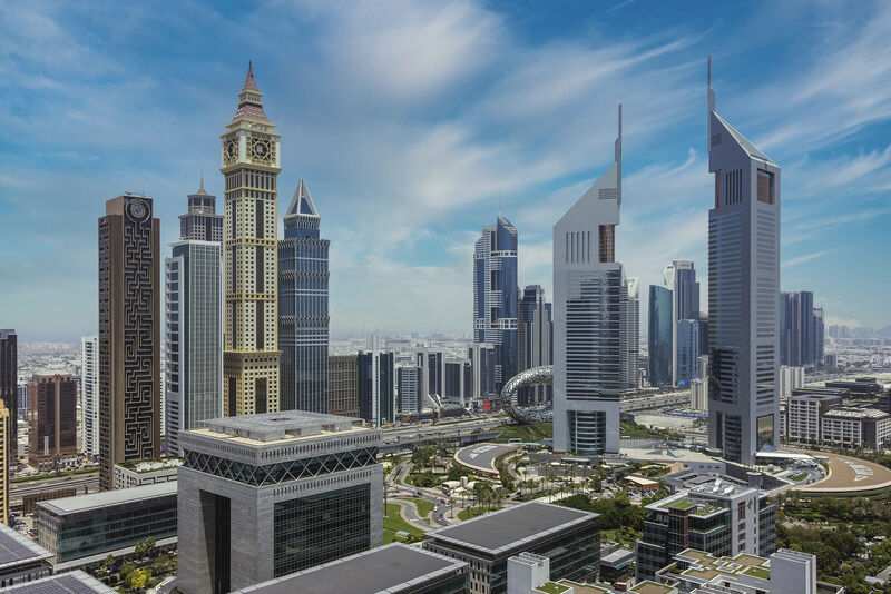Gate Building Dubai skyline with Emirates Towers