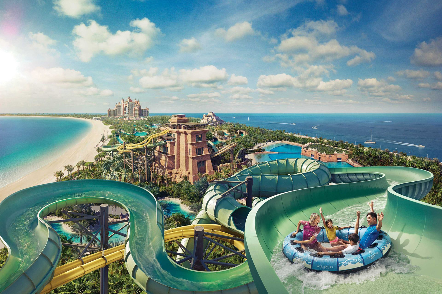 Kids sliding at Aquaventure Waterpark, a top thing to do on Palm Jumeirah