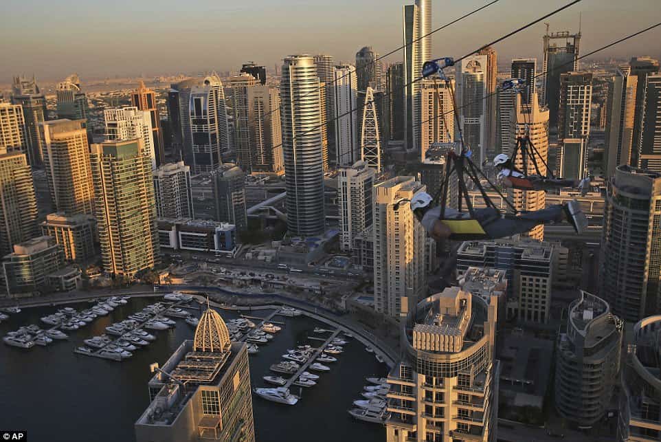 zip-lining in Dubai Marina skyline view